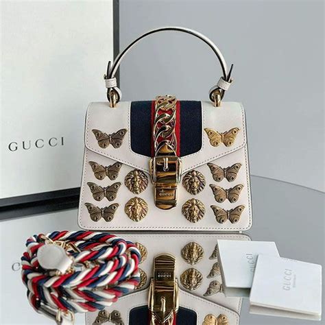 túi xách gucci sylvie mini|Túi Xách Tay Nữ Gucci Beige Leather Mini Sylvie Animal Stud .